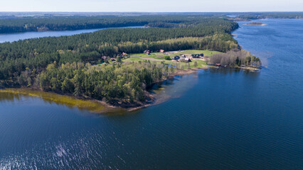 Aerial View of Rural Landscape with Lake, Forest and houses