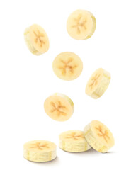 Falling sliced banana isolated on transparent background. Ripe peeled circular pieces of yellow banana. natural sweet and healthy snack, dessert of tropical fruit. Realistic 3d vector illustration.