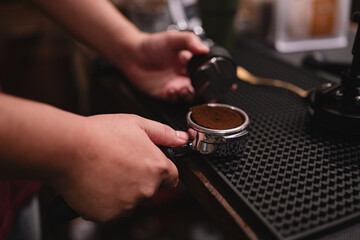 In lively cafes, the barista expertly used the machine as a tool to tamp the espresso beans, creating a rich hot drink that delivered a perfect dose of caffeine bliss.