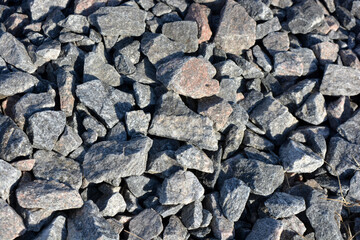 Original background, building materials, construction chippings, a lot of gray stones.