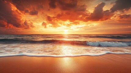 Obraz premium A stunning beach at sunset, with golden sand and calm waves, the horizon glowing with rich oranges and pinks, ideal for vacation imagery