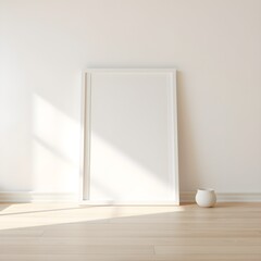 White Picture Frame on Wooden Floor Against Bare Wall