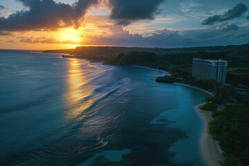 Fototapeta premium Serene beach scene with large white building blue roof on sandy shore. Few people walk along shoreline, surrounded by small trees. Blue sky with clouds, warm sun glow. Tropical paradise with calm