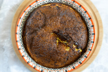Omelette in a beautiful shape cooked in an electric grill.