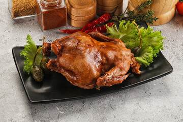 Baked small chicken with spices
