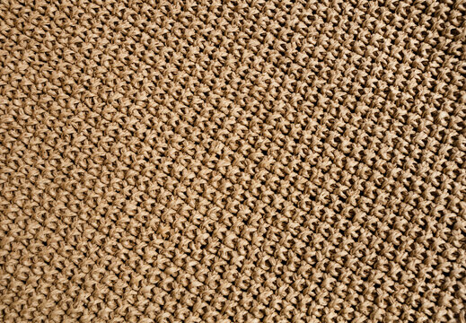 Beige raffia crochet texture. Crocheted bags, clutches, hats, wallets.