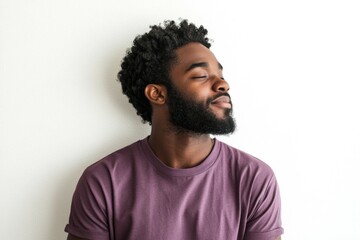 Fototapeta premium A person wearing a purple shirt and a beard, likely a unique character or individual.