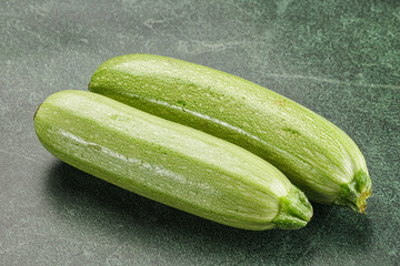 Raw green ripe zucchini vegetable