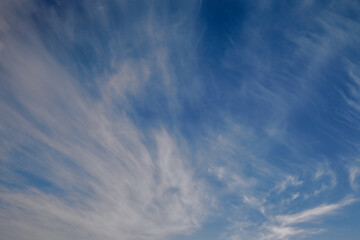White wispy clouds across the sky, wispy clouds in the sky