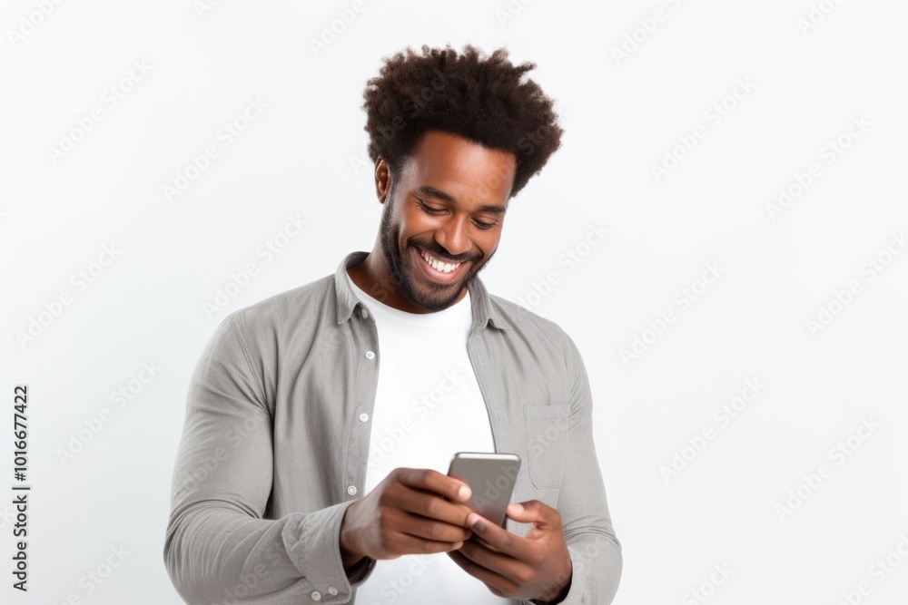 Poster Smiling looking at his phone adult man white background.