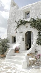 Charming white house with lush greenery and steps, inviting atmosphere perfect for relaxation and aesthetic appeal.