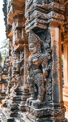 Obraz premium Intricate stone sculpture of a mythical figure, showcasing detailed carvings and rich cultural heritage in temple architecture.