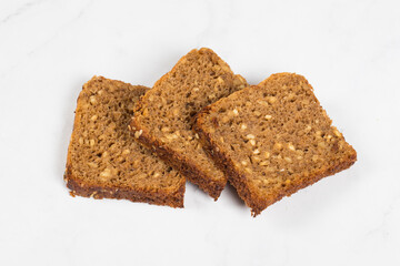 Fitness whole grain bread with sunflower seeds. Close-up