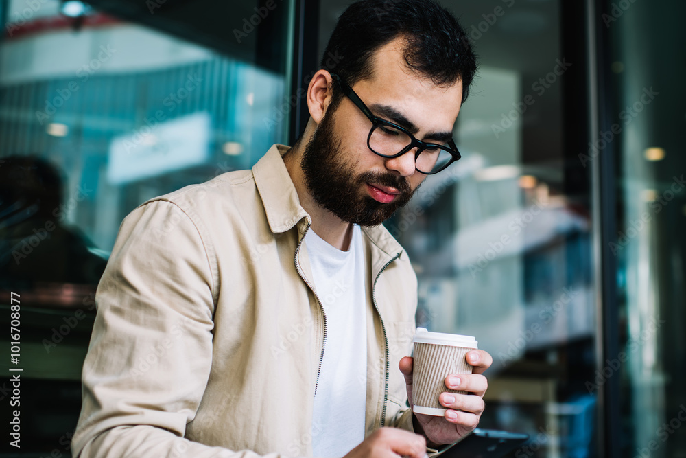 Poster intelligent male programmer in optical spectacles searching information about online courses for stu