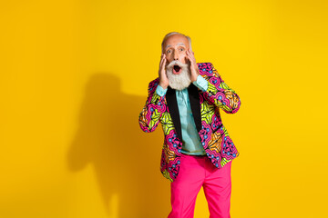 Photo of impressed aged man open mouth classy vibrant outfit empty space isolated on yellow color background