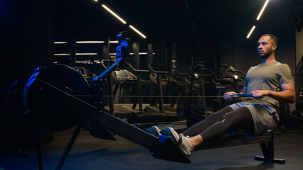 Powerful heavy weight machine sportive equipment workout in sport gym sports club strong athletic...