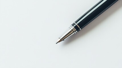 Close-up of a sleek black pen on a white background, showcasing elegant design and simplicity, ideal for writing, office, and business themes.