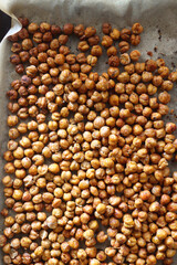 Sheet pan with homemade roasted chickpeas. Top view.