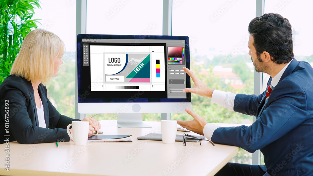 Poster graphic designer software for modern design of web page and commercial ads showing on the computer s