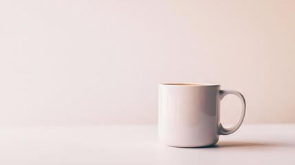 Minimalist white coffee mug on a blurred background, perfect for branding, advertisement, or concept of simplicity and calm.
