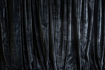 Obraz premium close up horizontal image of a black velvet curtain background