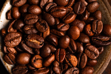 Naklejka premium coffee beans close-up, delicious coffee