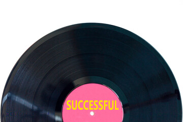 Successful symbol. Concept word Successful on beautiful black purple vinyl disk. Beautiful white background. Business successful concept. Copy space.