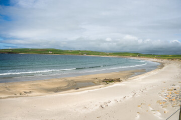 Beach on a bay around Skara Brae in the Orkney Islands