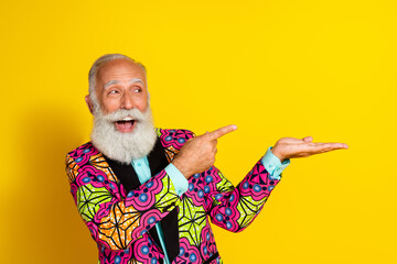 Photo portrait of nice senior male look hold point empty space wear trendy colorful fancy outfit...