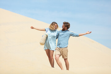 couple on vacation on the pilat dune in france