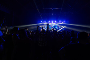 Audience silhouette on the concert background,