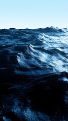 Fototapeta premium A large body of water with foreground waves and background blue sky