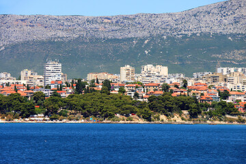 Contemporary buildings, gardens and beaches at the waterfront in Split, Croatia. View of Split from the boat. © jelena990