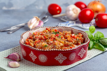 Appetizer of finely chopped baked vegetables.