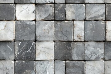 Closeup of a gray stone tile wall texture with a geometric pattern and natural marble or granite...