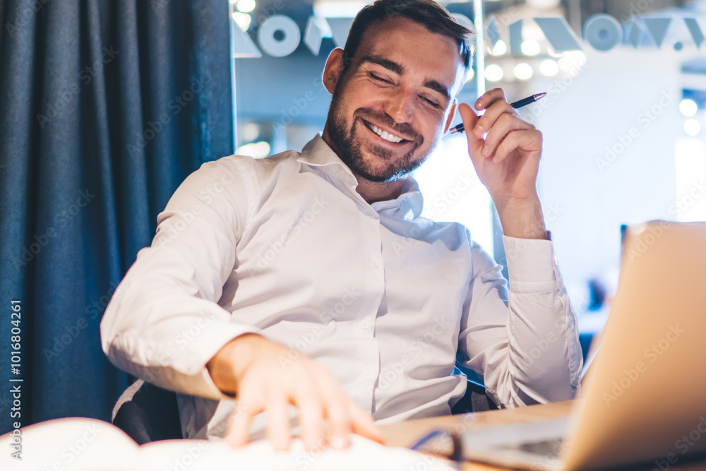 Aufkleber happy successful male trader formally dressed reading information from textbook for planning schedul