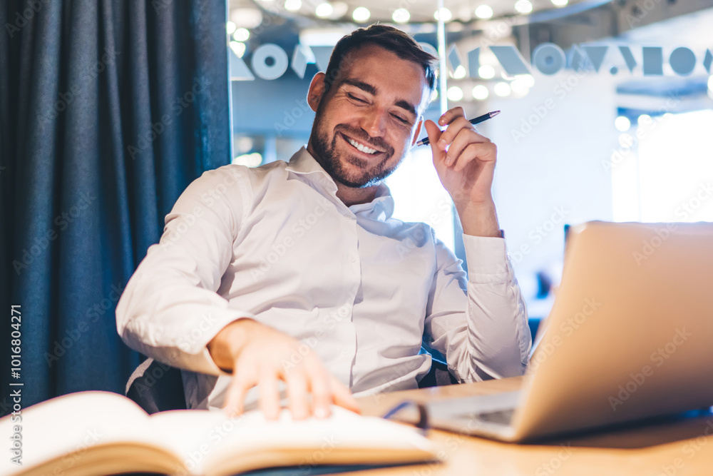 Aufkleber happy successful male trader formally dressed reading information from textbook for planning schedul
