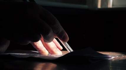 Drawing a line on paper with pen