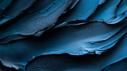 Obraz premium A tight shot of blue paint on an expansive artwork's canvas, evidently hand-painted