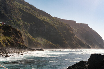 Porto Moniz Natural Swimming Pools view with ocean and mountains