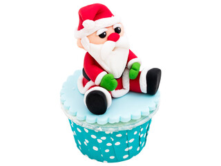 Santa Claus Cupcake: Festive Christmas treat. A delightful cupcake decorated with a charming Santa Claus figurine. Perfect for holiday celebrations and winter festivities.