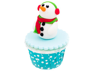 Snowman Cupcake: A delightful winter wonderland cupcake, adorned with a charming snowman figurine, complete with a green hat, red scarf, and adorable earmuffs.