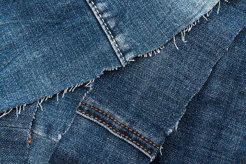 Fototapeta premium Texture from torn pieces of denim. Jeans texture. Material for sewing clothes