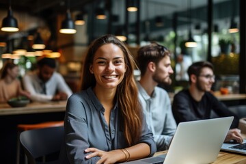 Working woman laptop computer smiling.