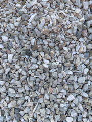  Small stones or a decorative grey rocks as texture. Garden gravel background