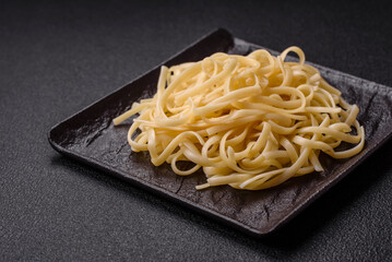 Rice noodles with beans, meat, tomato sauce, spices and herbs