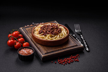 Rice noodles with beans, meat, tomato sauce, spices and herbs