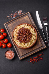 Rice noodles with beans, meat, tomato sauce, spices and herbs