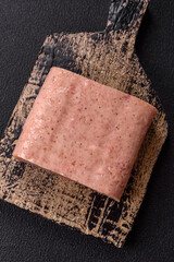 Delicious canned pink spiced ham or spam with salt, spices and herbs