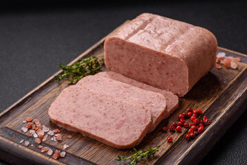 Delicious canned pink spiced ham or spam with salt, spices and herbs
